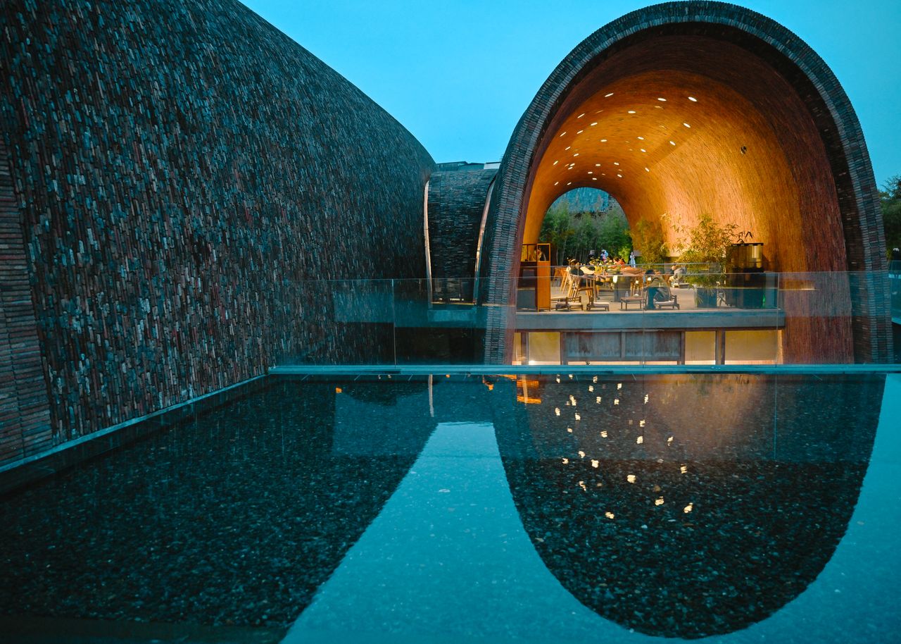 Contemporary architecture with water reflection at the Imperial Kiln Museum, Jingdezhen.